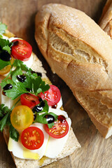 Open sandwich with mozzarella on italian bread