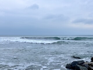 waves crashing on rocks