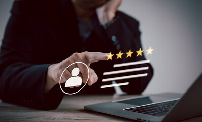 business professional confidently uses a mobile device to give a 5-star rating, expressing satisfaction and appreciation for the exceptional services recently the value of quality service business.	
