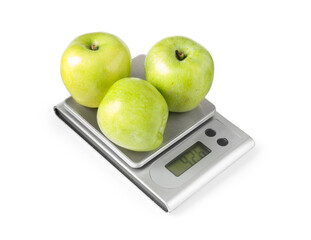 Electronic kitchen scale with apples isolated on white