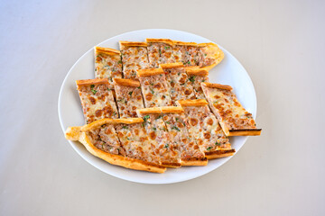 Kiymali pide.Turkish pide with minced meat. Turkish pizza mince pita Pide on white . Etli ekmek.Kusbasi kasarli, kiymali kasarli, kiymali yumurtali, Bafra, Trabzon, Kusbasili pide. Urfa acili lahmacun