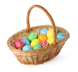 Happy Easter. Bright painted eggs in wicker basket isolated on white