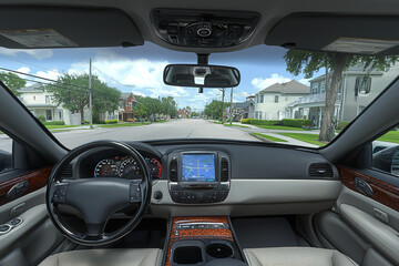 View from passenger seat of a vehicle on a street