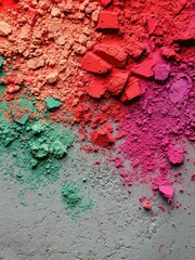 Vivid colored powders scattered on gray surface, artistic creativity