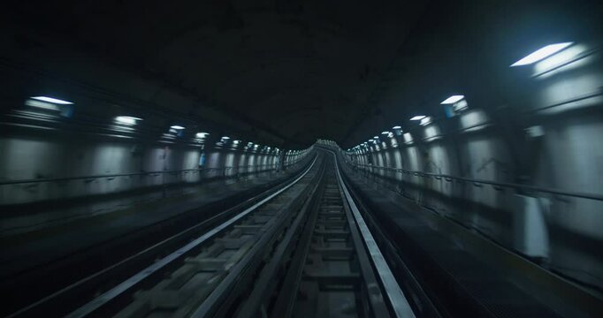 Cabin POV View Of Driverless Metro Train Arriving At Station