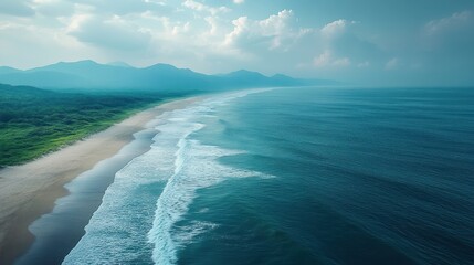 Naklejka premium Coastal aerial view, waves, beach, mountains, sunrise