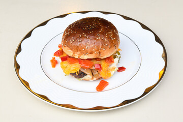 Big tasty burger with beef cutlet on a plate. Hamburger, cheeseburger with mushroom. Hamburger, Mexica, mushroom double burger.  Crispy chicken burger. With french fries, patates kizartmasi.