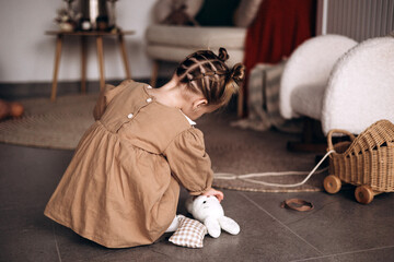 little girl with a hare