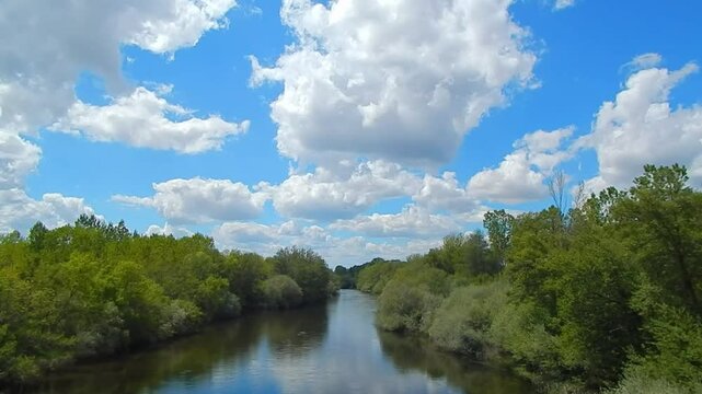 river in the forest in a sunny day with a blue sky with clouds, Tera river in Zamora, Castilla y Le&oacute;n, Spain
