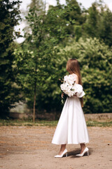 Girl holding a bouquet
