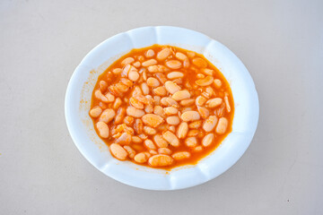 Turkish Etli Kuru Fasulye food with Traditional Turkish table with decoration. Nohut yemegi. Pilav ustu, kuru fasulye, nohut. Gunun menusu.