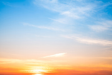Beautiful , luxury soft gradient orange gold clouds and sunlight on the blue sky perfect for the background, take in evening,Twilight, Large size, high definition landscape photo