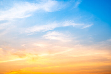 Beautiful , luxury soft gradient orange gold clouds and sunlight on the blue sky perfect for the background, take in evening,Twilight, Large size, high definition landscape photo