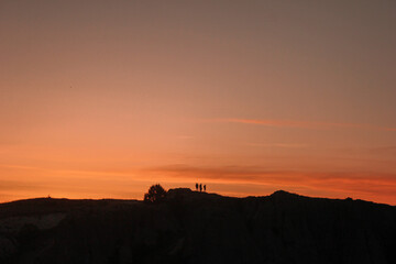 Fototapeta premium A breathtaking sunrise with hot air balloons in Cappadocia, Turkey. 