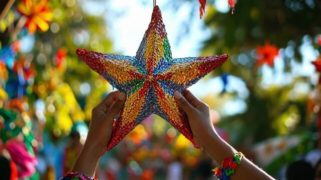 Hands holding colorful pinata star at festive outdoor celebration Happy Cinco de mayo