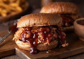 Barbeque pulled chicken sandwiich on whole wheat bun