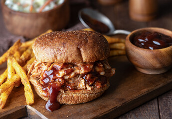 Barbeque pulled chicken sandwiich on whole wheat bun