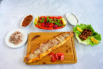 Kiymali pide.Turkish pide with minced meat. Turkish pizza mince pita Pide on white . Etli ekmek.Kusbasi kasarli, kiymali kasarli, kiymali yumurtali, Bafra, Trabzon, Kusbasili pide. Urfa acili lahmacun