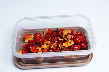Dried Chinese dates in plastic boxes for making shabu soup