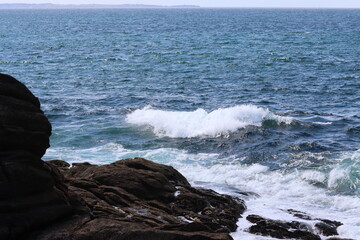 waves crashing on rocks