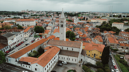 Obraz premium Flying above historic city of Pula , historic Roman amphitheatre of Pula aerial view, tourism in Croatia