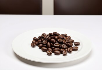 Close-up of roasted coffee beans on a plate on a table