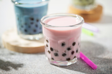 Different Healthy vegan drink Matcha  Latte  with Boba or Tapioca pearls in glasses. Bubble tea concept