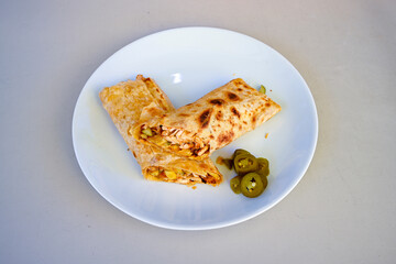 Lavash zurna doner kebab ( zurna  durum )  or shawarma sliced in plate isolated.  hatay usulu tavuk Et doner durum. Gobit ekmek arasi doner. Pilavustu iskender doner kebap. 