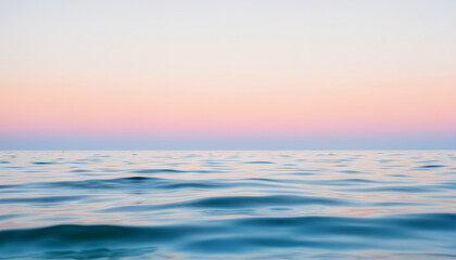 Obraz premium Calm ocean at dawn with gentle waves, serenity in nature