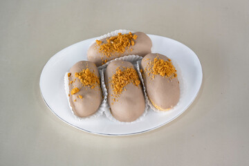 Ekler Pasta Turkish delicious ekler pasta with plate. Klasik, cikolatali, muzlu, frambuazli, karamelli, cilekli, oreolu ekler.