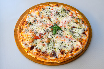 Traditional Turkish cuisine. Pizza, pita, pidesi, sucuk, hummus, kebab. Many dishes on the table. Serving dishes in restaurant. Mix, formaggi, veggie pizza. Top view, flat lay