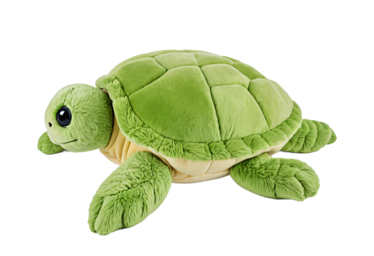 A green plush toy turtle with a beige shell and blue eyes rests on a white surface, facing left and slightly tilted, creating a charming and playful scene