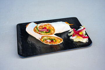 Lavash zurna doner kebab ( zurna  durum )  or shawarma sliced in plate isolated.  hatay usulu tavuk Et doner durum. Gobit ekmek arasi doner. Pilavustu iskender doner kebap. 