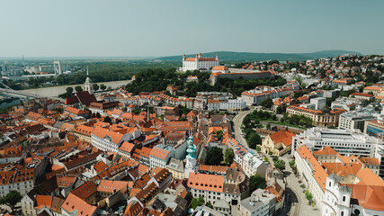 Obraz premium Bratislava old town view castle and city church in city centre. bratislavy skyline aerial view drone footage of bratislava slovakia city.