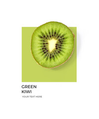 Creative layout made of green kiwi on the green and white background. Flat lay. Food concept. Lemon on white background.