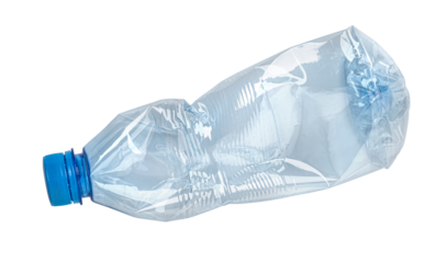 Crushed plastic bottle lying on white background representing recycling