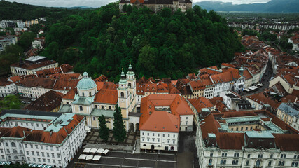 Establishing Aerial view of Ljubljana Castle on hill in historical city. Capital of Slovenia,...