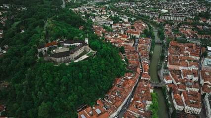 Establishing Aerial view of Ljubljana Castle on hill in historical city. Capital of Slovenia,...