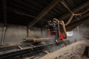 Fototapeta premium Sawing wood into boards