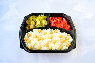 Traditional delicious Turkish food; Turkish style rice pilaf (Turkish name; Arpa sehriyeli. tavuk, kuru fasulyeli, pirinc pilavi). Cigerli, kavurmali, tereyagli nohut pilav.
