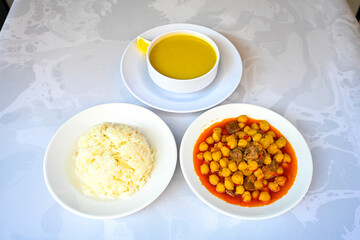 Traditional delicious Turkish food; Turkish style rice pilaf (Turkish name; Arpa sehriyeli. tavuk, kuru fasulyeli, pirinc pilavi). Cigerli, kavurmali, tereyagli nohut pilav.