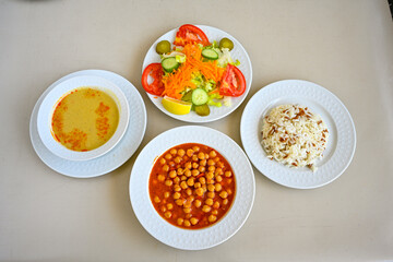 Traditional delicious Turkish food; Turkish style rice pilaf (Turkish name; Arpa sehriyeli. tavuk, kuru fasulyeli, pirinc pilavi). Cigerli, kavurmali, tereyagli nohut pilav.