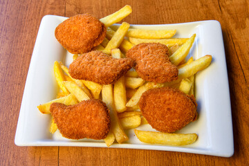 Homemade fried chicken nuggets isolated on white background. Chicken nugget. Citir tavuk. Citir, tavuk atistirma  tabagi.