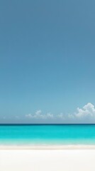 Fototapeta premium Tranquil beach scene, clear sky, turquoise water. Possible stock photo use