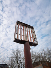 destroyed advertising sign, broken sales sign where you can see the neon tubes.
