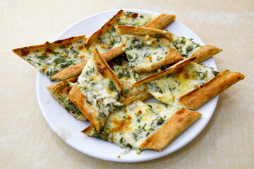 Kiymali pide.Turkish pide with minced meat. Turkish pizza mince pita Pide on white . Etli ekmek.Kusbasi kasarli, kiymali kasarli, kiymali yumurtali, Bafra, Trabzon, Kusbasili pide. Urfa acili lahmacun