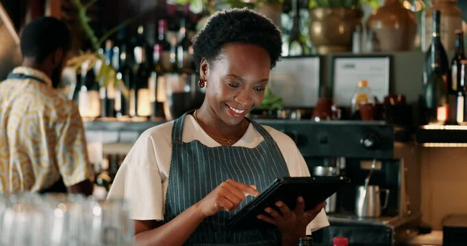Tablet, happy and woman barista in cafe for inventory, checklist or online order. Confident, digital technology and African female pub cashier by counter for pos in hospitality restaurant with bar.