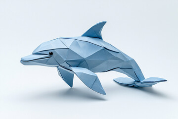 Light blue origami dolphin with geometric folds stands on a clean white background.