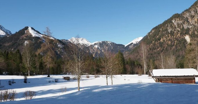 Pertisau and Tristenautal.on Karwendel park. Wooded valleys and snowy pastures at foot of Sonnjoch, Lamsenspitze, Dristenkopf and Rappenspitze mountains