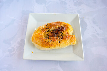 Turkish pastry product , tasty pogaca, acma . Simit, gevrek. Turkish Pastries; peynirli, patatesli, kasarli pogaca, sosili acma, dereotlu pogaca,  borek, acma, ay coregi at patisserie showcase.